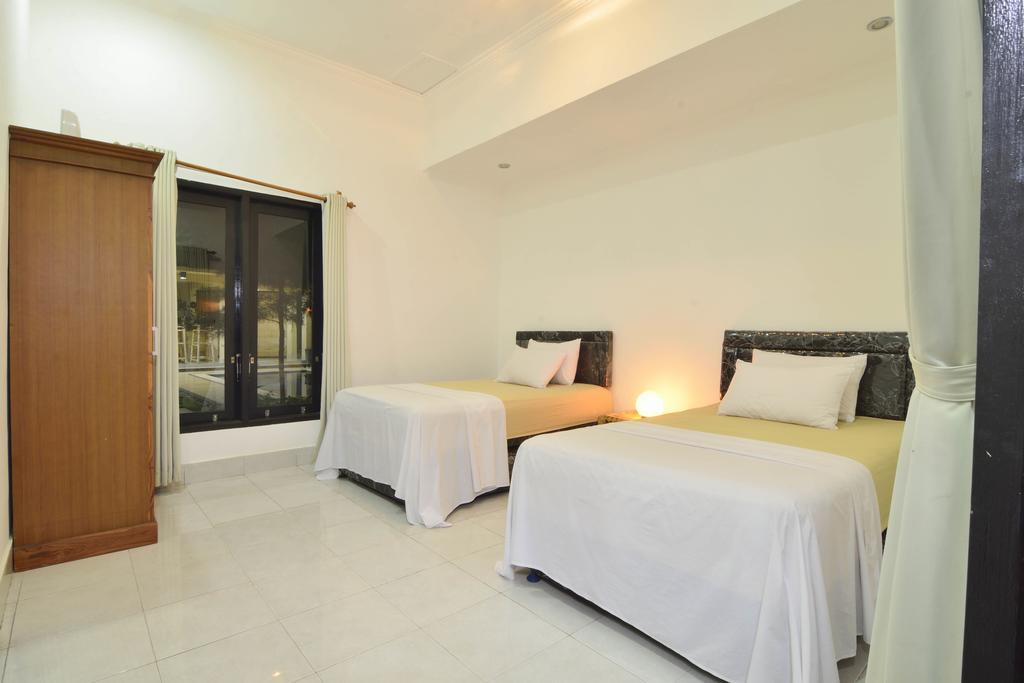 Santai Villa Kuta  Δωμάτιο φωτογραφία